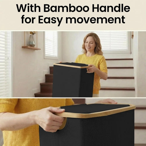 Woman carrying a black 75L slim laundry hamper using the ergonomic natural bamboo side handles for easy movement