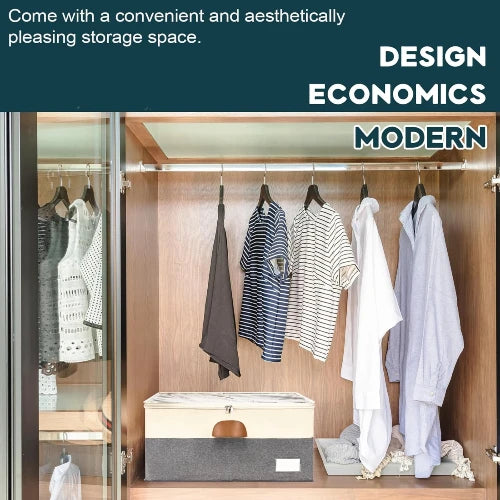 Large shoe organizer storage box in beige and grey positioned on the lower shelf of a modern wooden wardrobe closet with hanging shirts