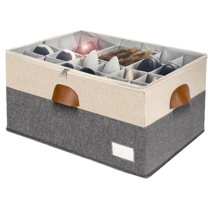 Large stackable closet shoe organizer box in beige and grey with clear zippered cover, adjustable dividers, and side handles holding pairs of shoes