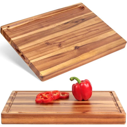 Reversible acacia wood butcher block showing both sides: top cracker compartment slot and reverse juice groove carving surface
